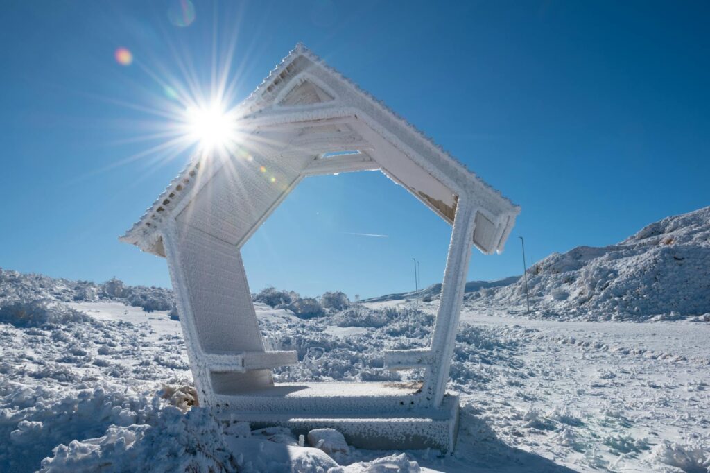 white hut on snowy wasteland in bosnia and herzegovina