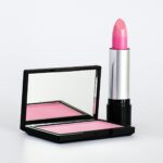 close up photo of pink lipstick and blush on