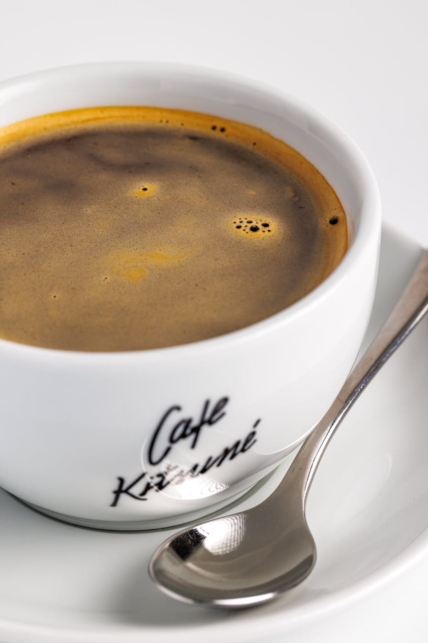close up of a coffee cup with cafe logo